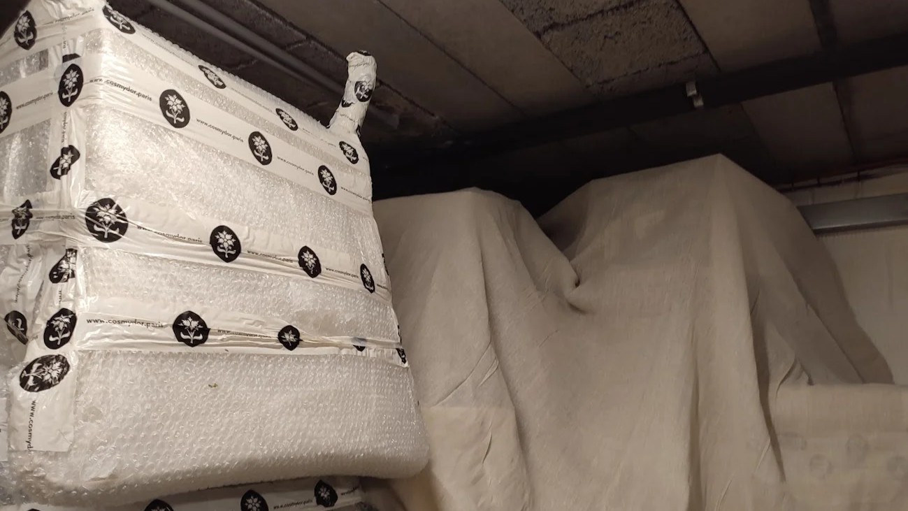 Flat removal service Kensington — wrapped furniture ready for transit