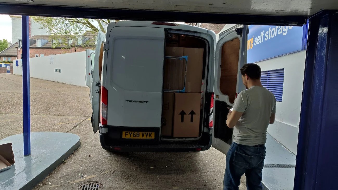 Office removal crew loading commercial furniture in West London