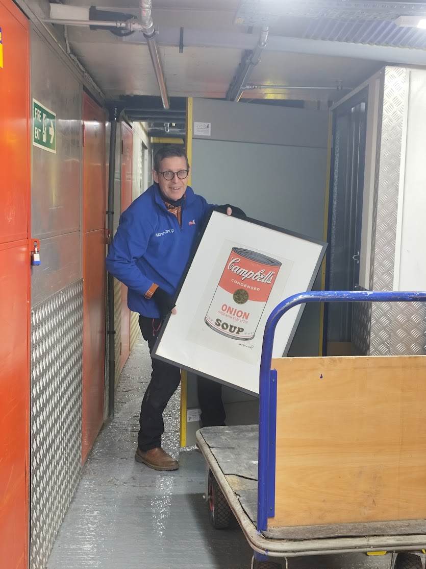 Gallery art transport London — Move-on Up team installing artwork at display location